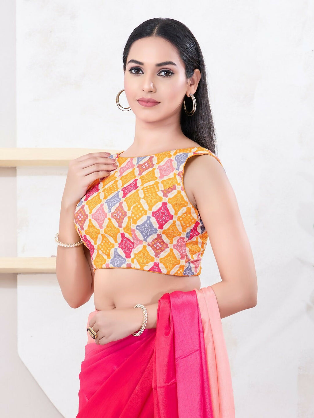 Yellow Bandhani Print Sleeveless Boat Neck Back Open Blouse