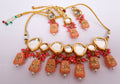 Peach Kundan stone necklace set with elegant gold-plated finish