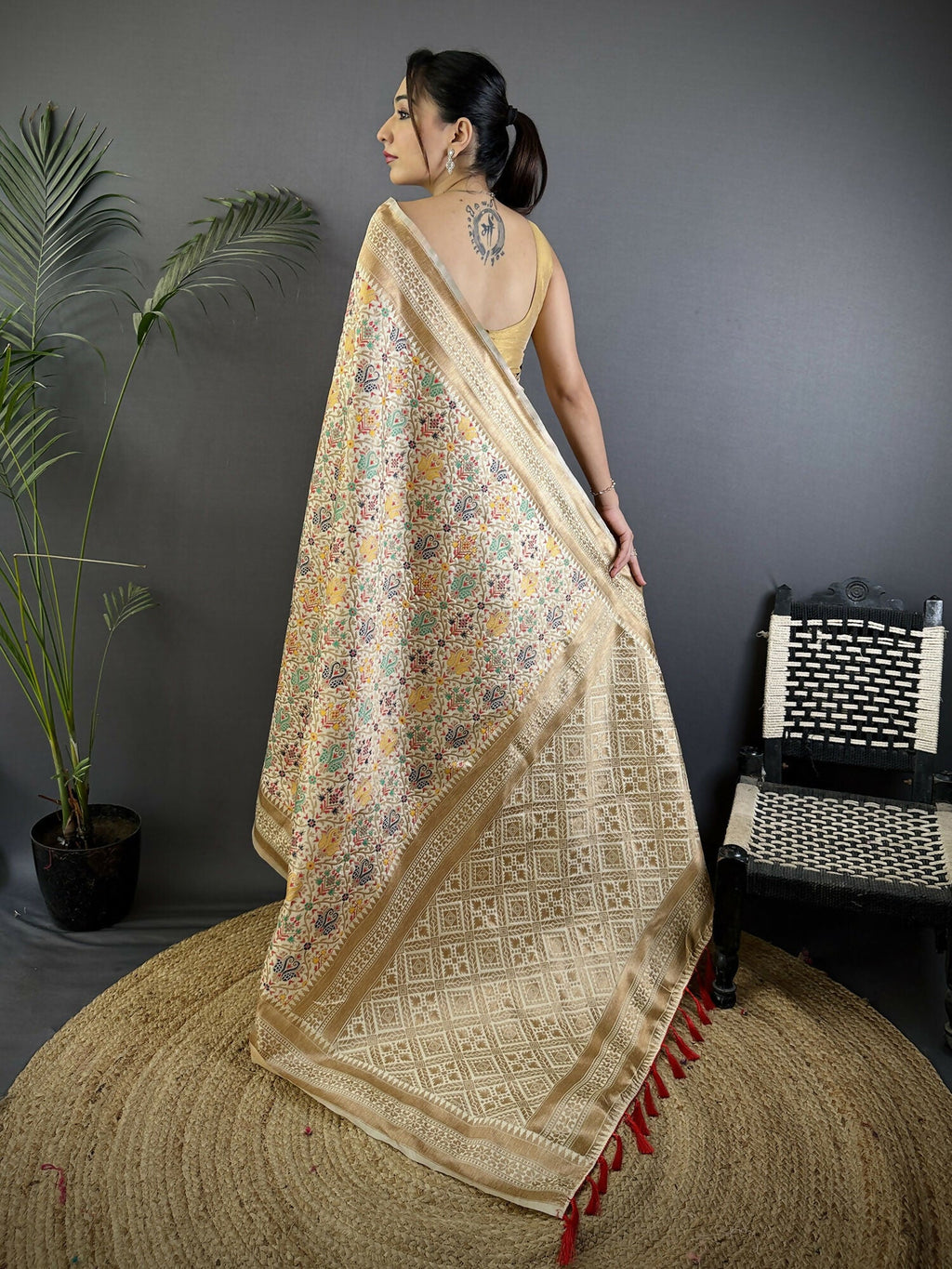Cream Soft Silk Banarasi Saree with Intricate Floral Woven Motifs