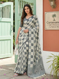 Stunning off-white linen cotton saree with a natural texture