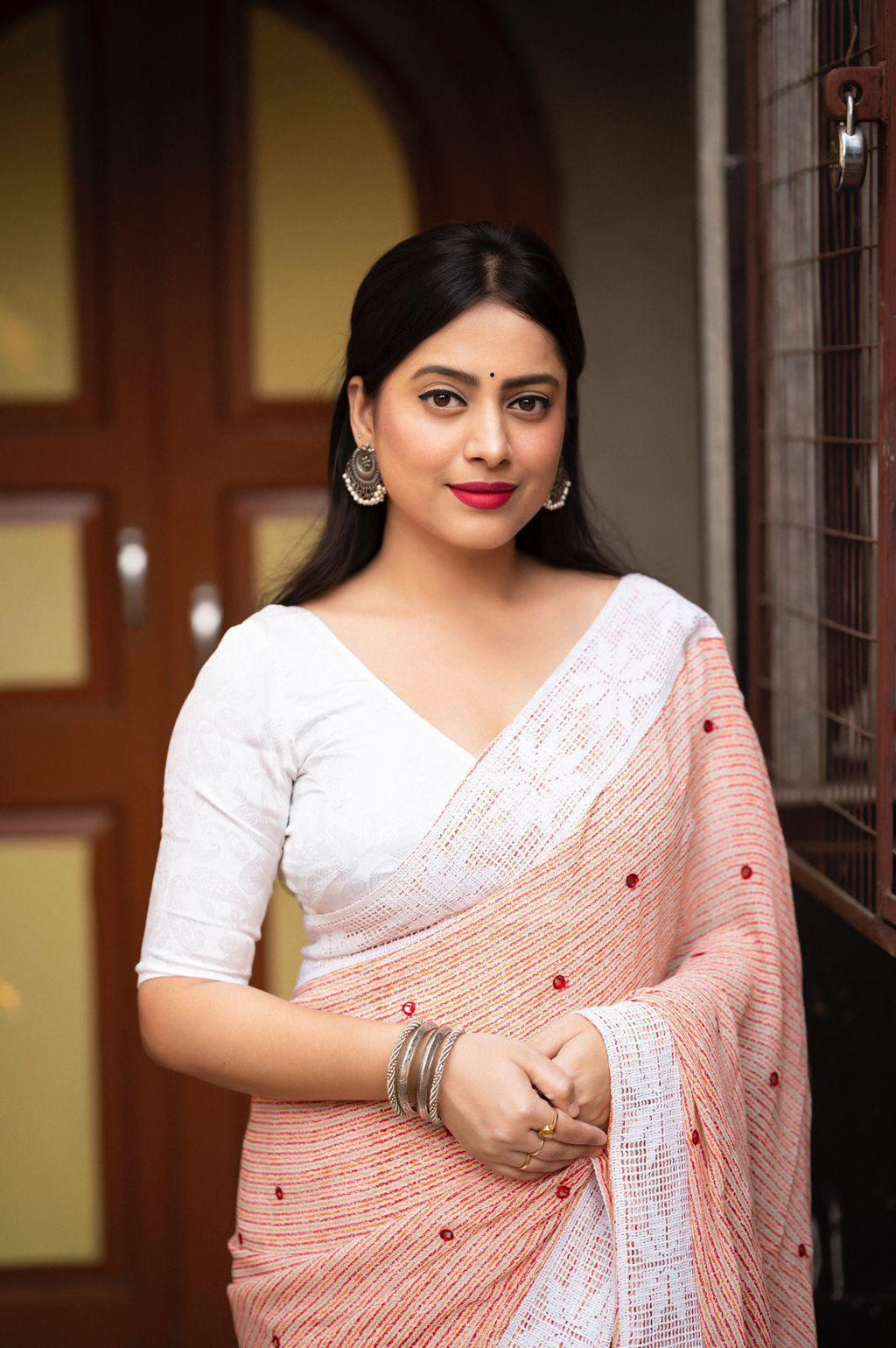 Peach Poly Georgette Saree with Aari Mirror Border