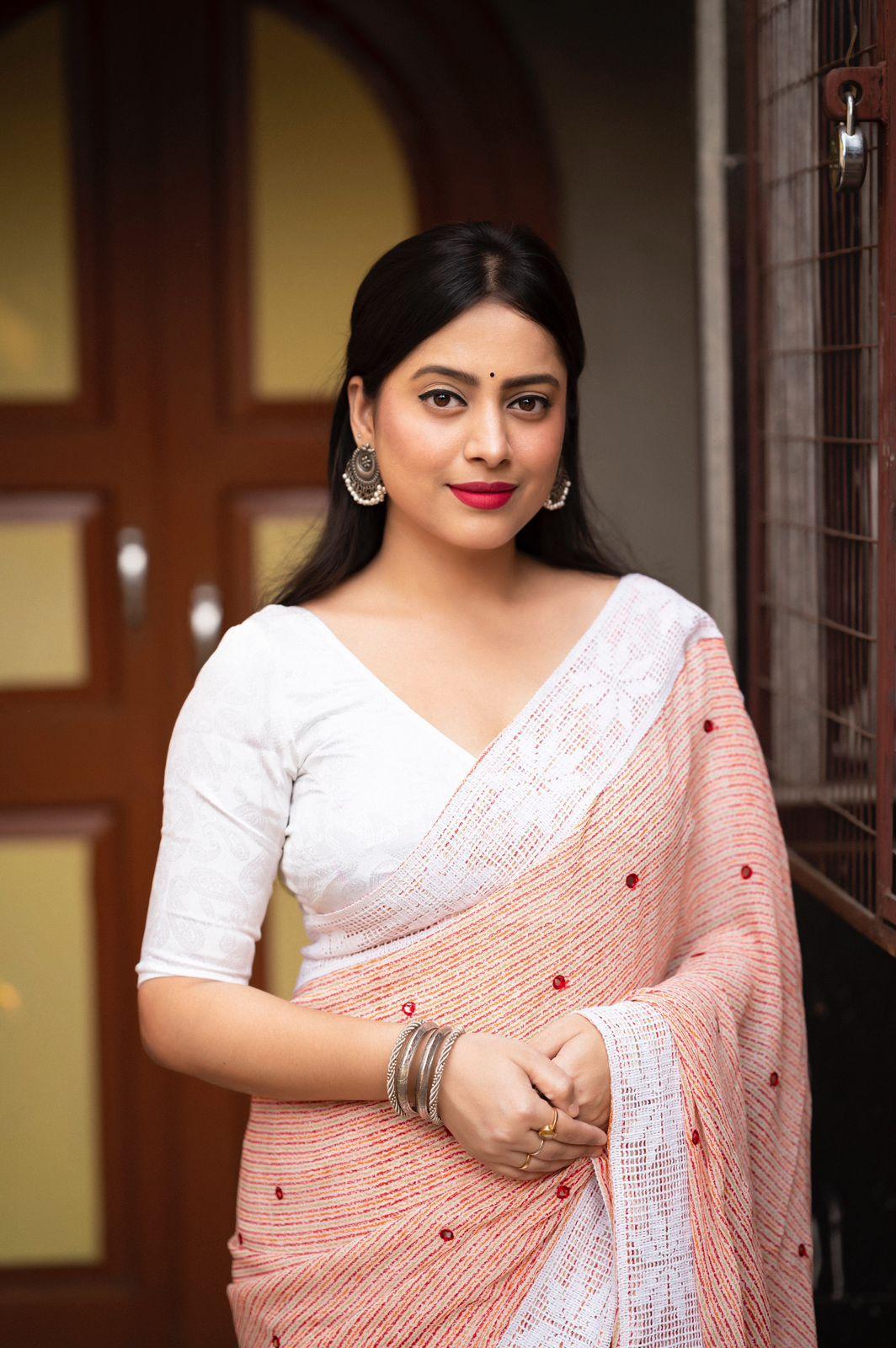 Peach Poly Georgette Saree with Aari Mirror Border