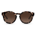 The Quinn sunglasses in Brown Pearl finish with gradient lenses and Italian acetate frames.