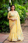 Yellow pure linen saree with ethnic motif embroidery and heavy phantom silk blouse