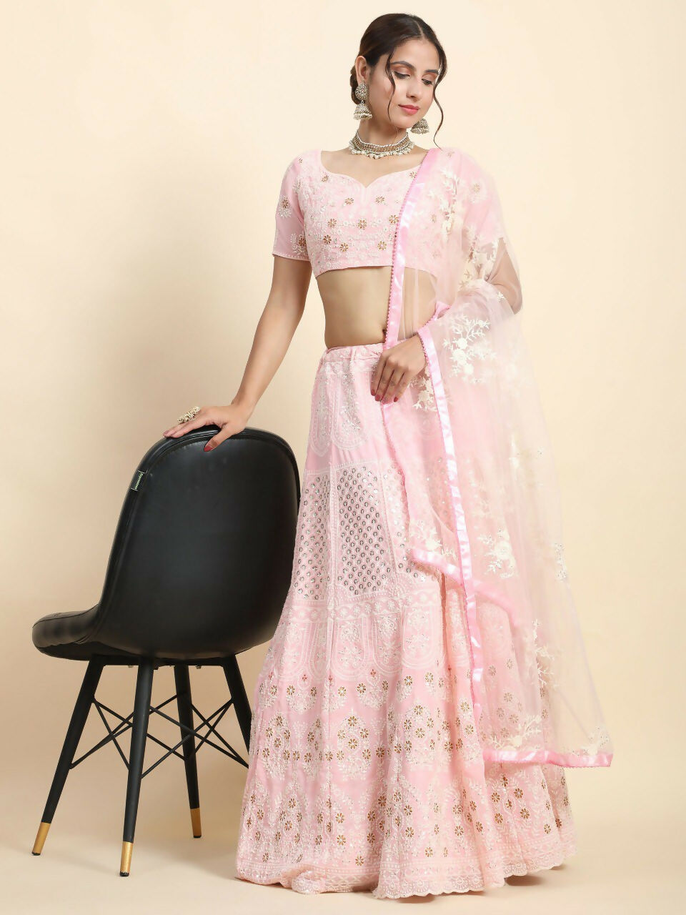 Baby pink faux georgette lehenga choli with sequins and jari embroidery