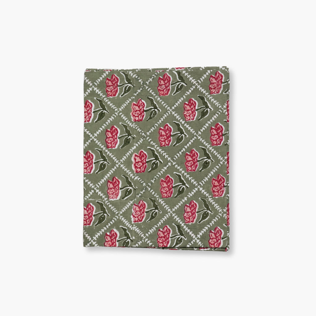 Noor table runner featuring olive and pink hand-block printed rose floral motifs on pure linen fabric