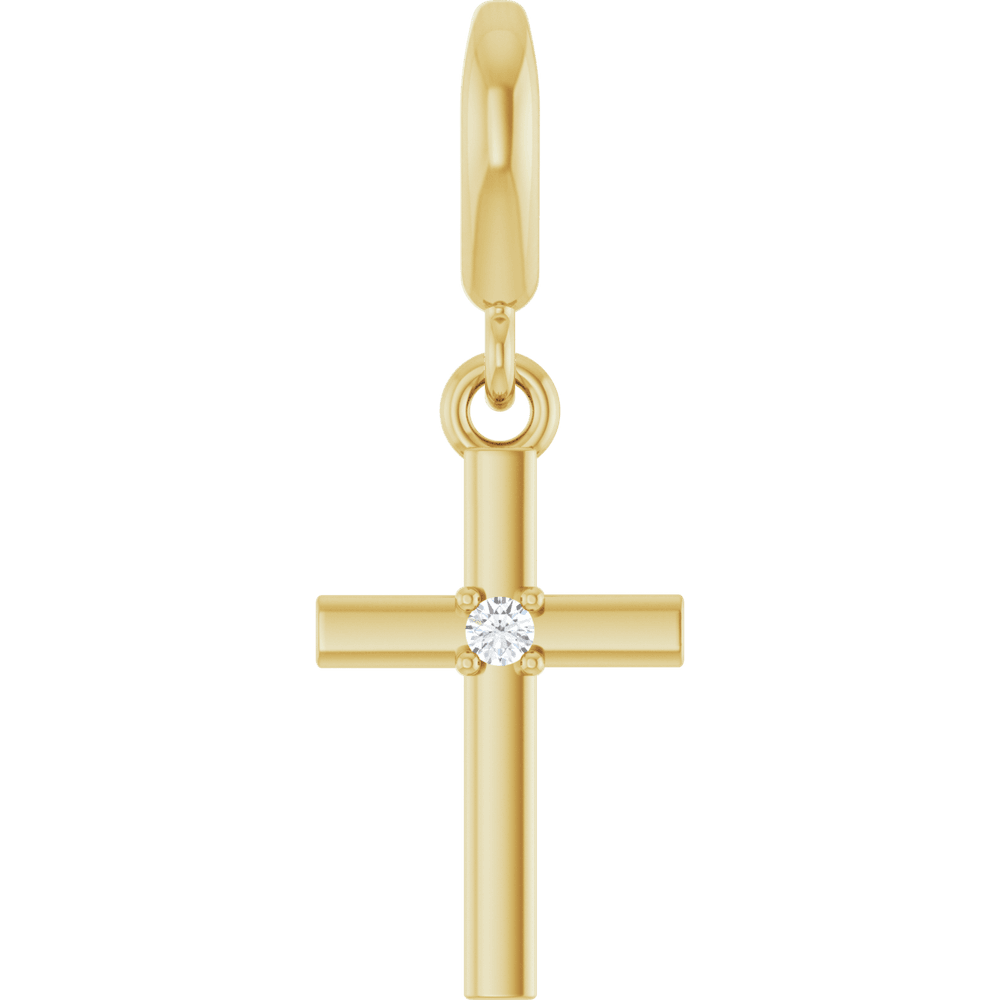 Minimalist Faith Diamond Cross Pendant in 14K yellow gold with a single round diamond accent.