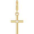 Minimalist Faith Diamond Cross Pendant in 14K yellow gold with a single round diamond accent.