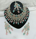 Bold pink and blue statement stone work necklace with long matching earrings