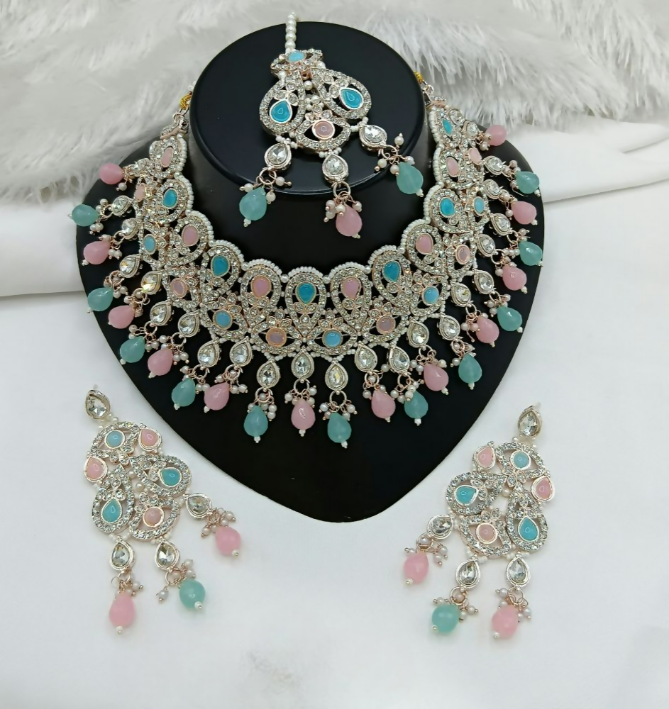 Bold pink and blue statement stone work necklace with long matching earrings