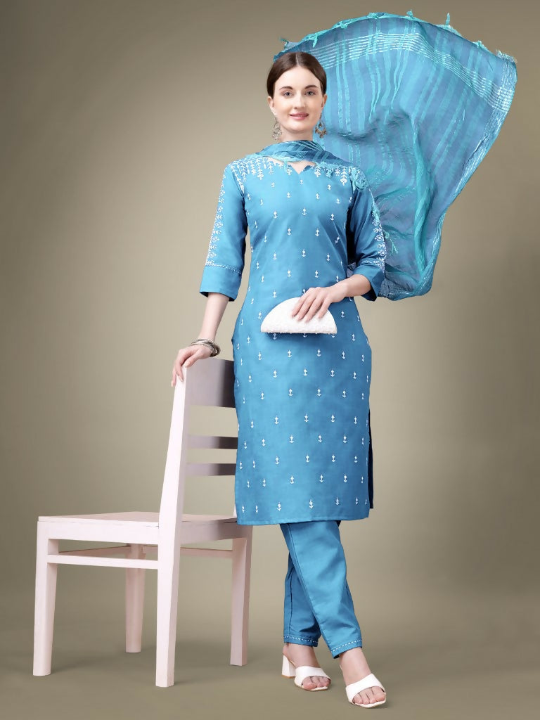 Women wearing a sky blue cotton blend straight kurta set with intricate embroidery and sequence work.