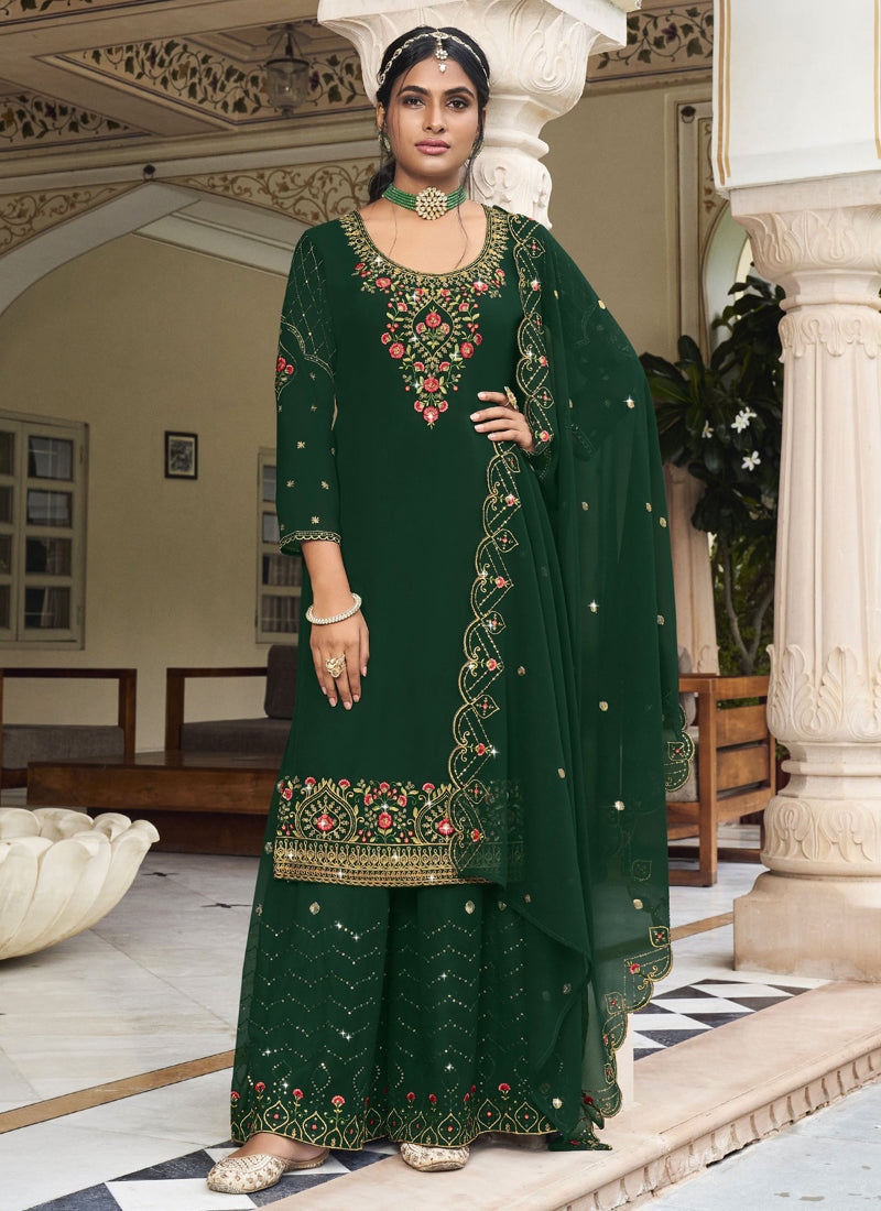 Model wearing a Green Georgette A-line Kurta with matching embroidered Sharara pants and dupatta.
