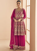 Front view of a pink georgette designer palazzo suit with intricate gold embroidery