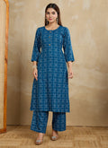 Model wearing a classic blue printed cotton blend kurta and trouser pant set