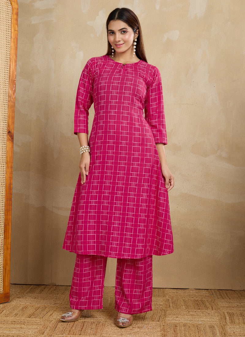 Pink printed cotton blend kurta set featuring a matching trouser