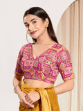 Pink viscose rayon padded blouse featuring a V-neck and elbow sleeves