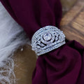 Silver-tone adjustable brass ring displayed against a white background
