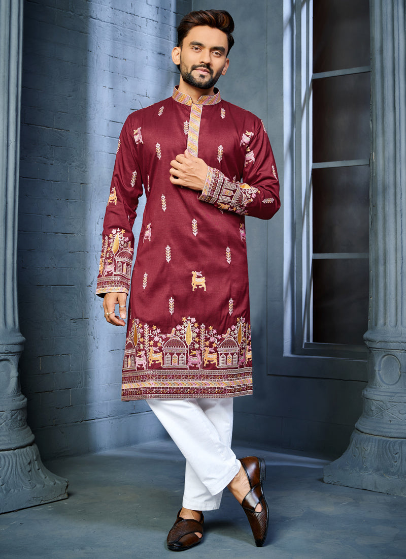 Maroon soft silk A-line kurta featuring multi-thread embroidery with a deer pattern at the daaman
