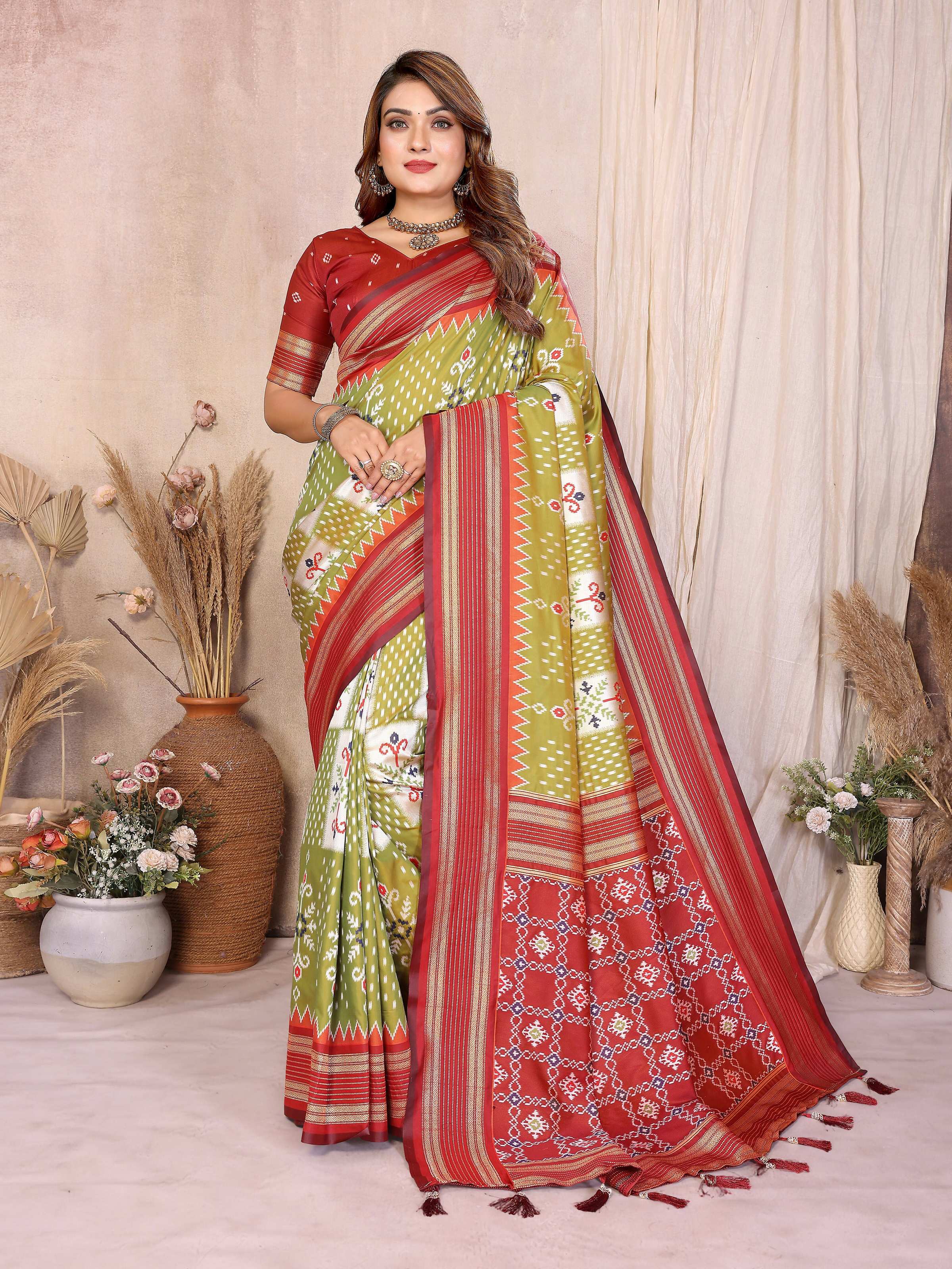 Pista-colored soft silk saree with traditional woven details.