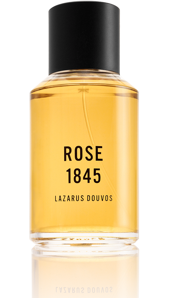 ROSE 1845 Body Oil Mist bottle featuring a luxurious floral design and 100ml label
