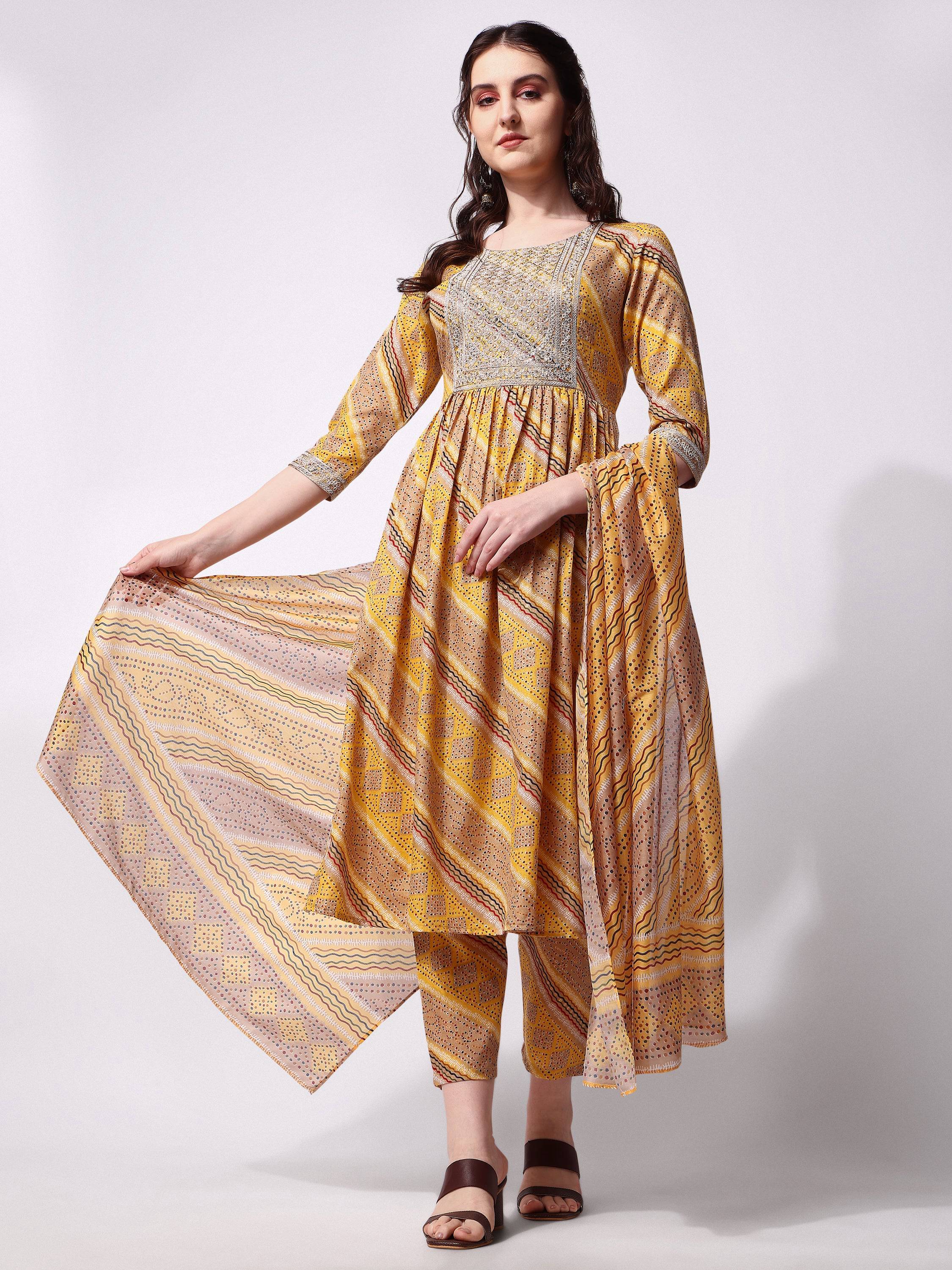 Nayra cut embroidered kurta with pants and dupatta in multicolor rayon.