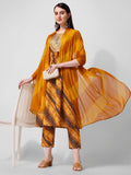 A woman wearing a multicolor embroidered and printed kurta set featuring a matching dupatta and pants.