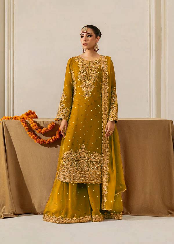 Bright yellow georgette palazzo suit with sequence and rivet moti details