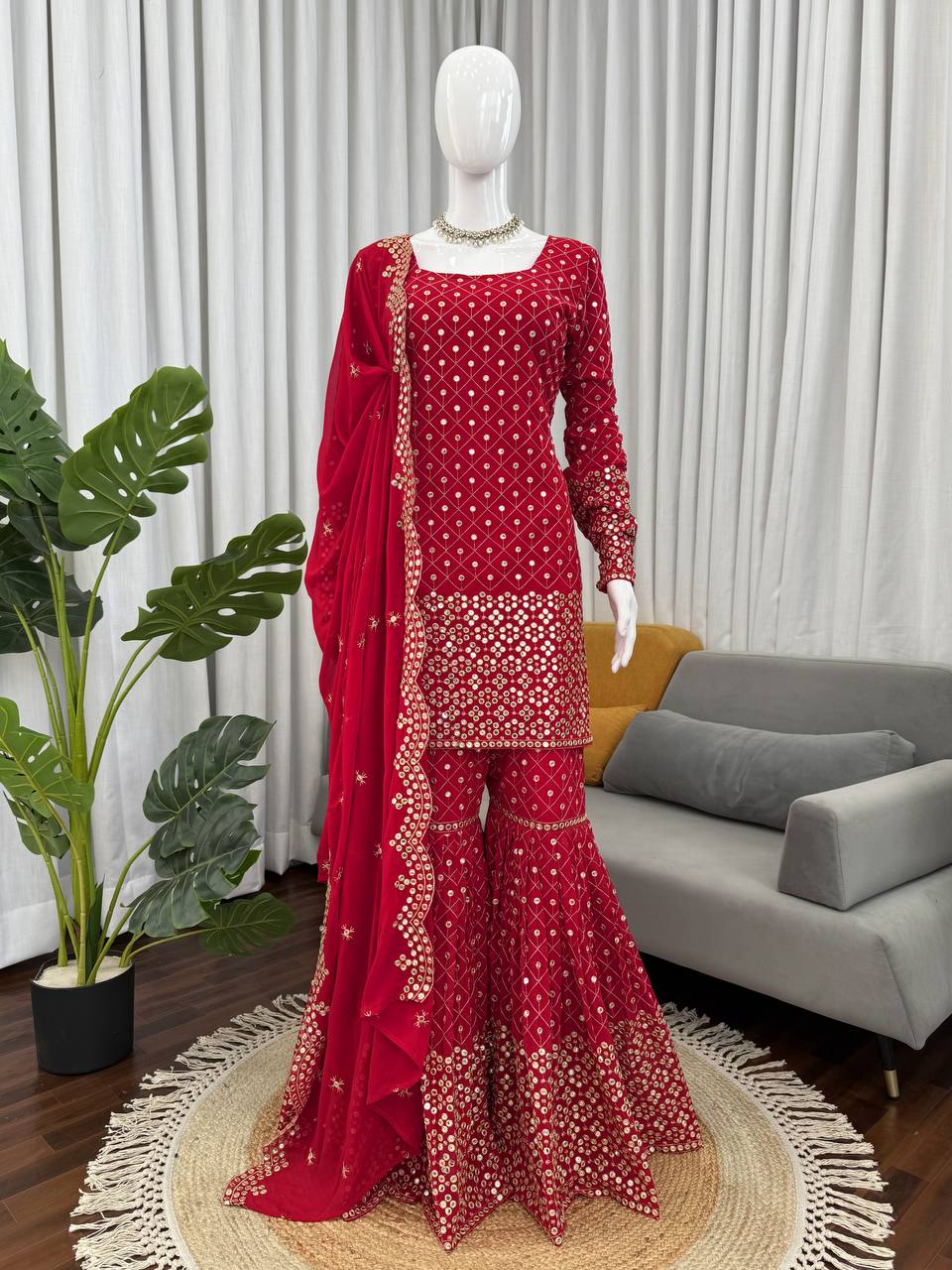 Red faux georgette sharara suit with thread work and 9mm sequins
