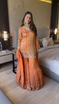 Elegant orange georgette sharara suit with intricate thread and sequin embroidery detail