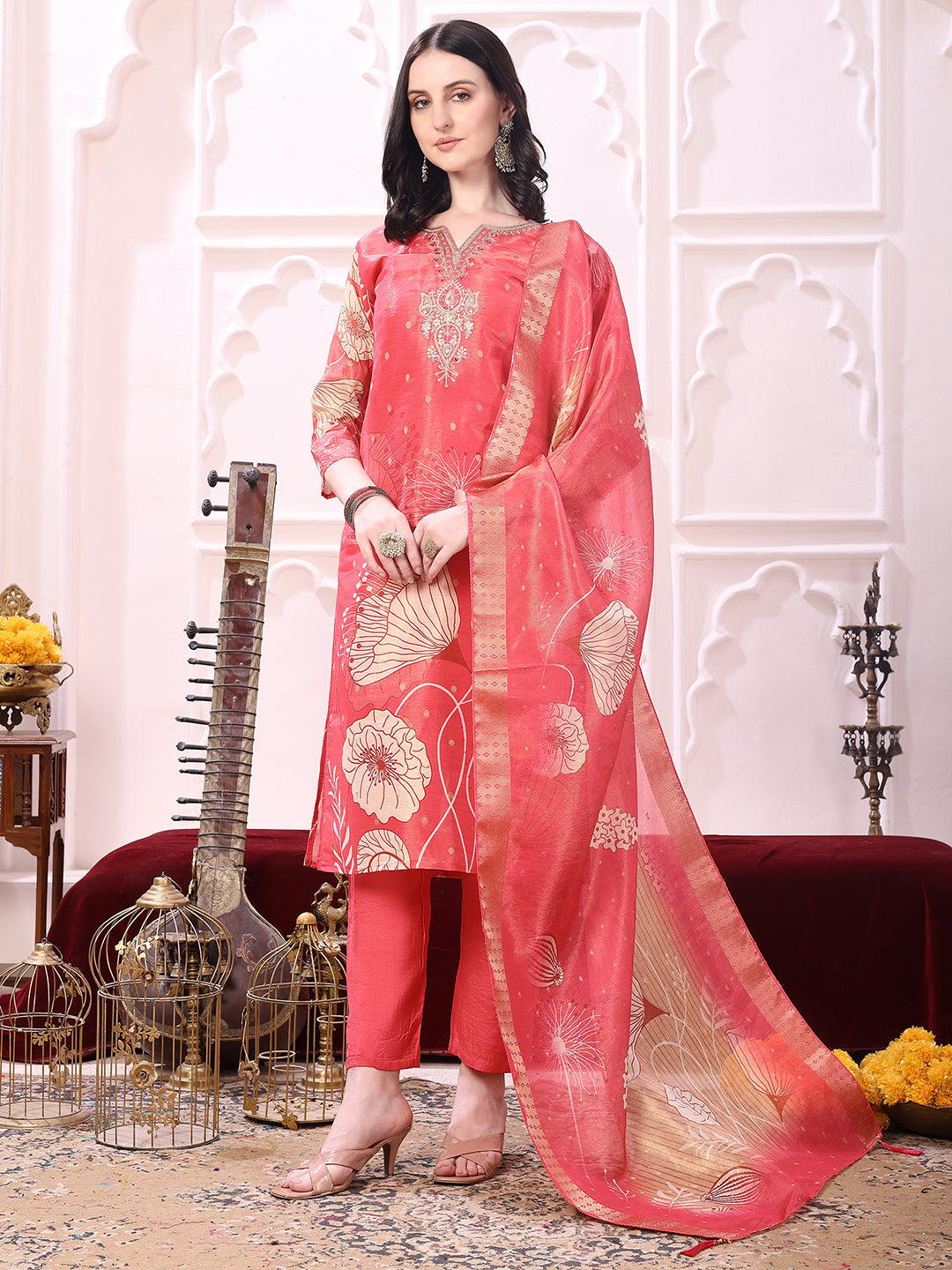 Coral silk kurta set with floral print and embroidered yoke, including coordinated pant and dupatta
