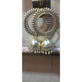 Tribal collection chandbali and dangler jhumka earrings with ornate metal detailing.