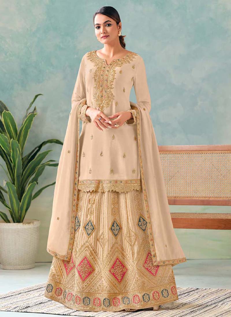Detailed shot of Cream Premium Chinon fabric with heavy embroidery on a palazzo suit