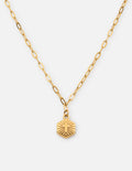 Minimalist Radiant Cross necklace in bright gold on a clean background