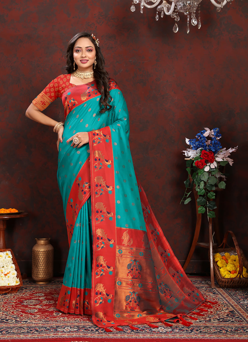 Vibrant teal soft Paithani silk saree with red borders and gold zari meenakari weaving detail