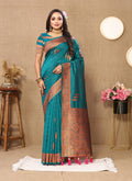 Rama soft silk saree with intricate copper zari weaving and rich pallu with tassels