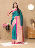 Rich teal soft silk saree with gold zari geometric patterns and pink contrast border
