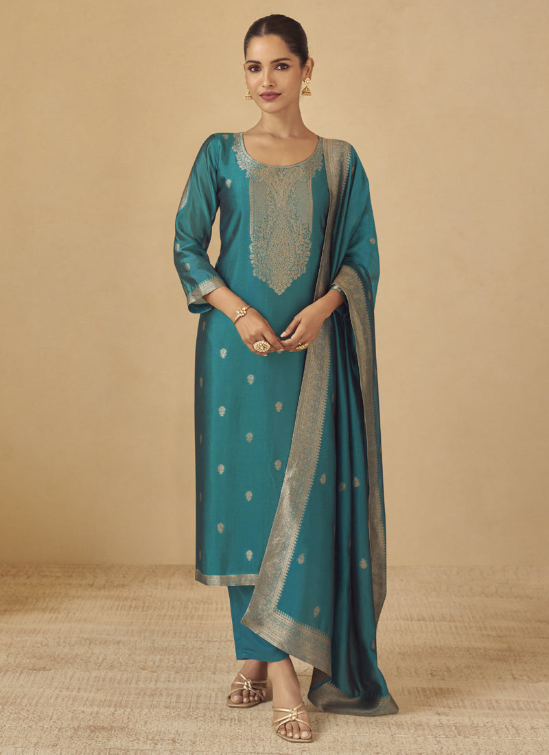 Model wearing a Rama colored Viscose Silk Jacquard wedding salwar suit with gota patti embroidery