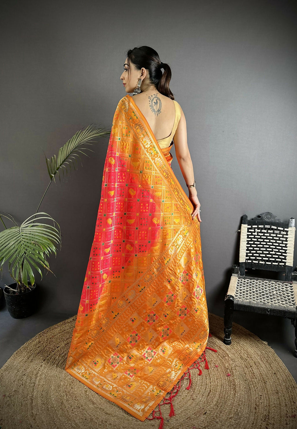 Pastel Orange Geometric Pattern Soft Silk Patola Saree