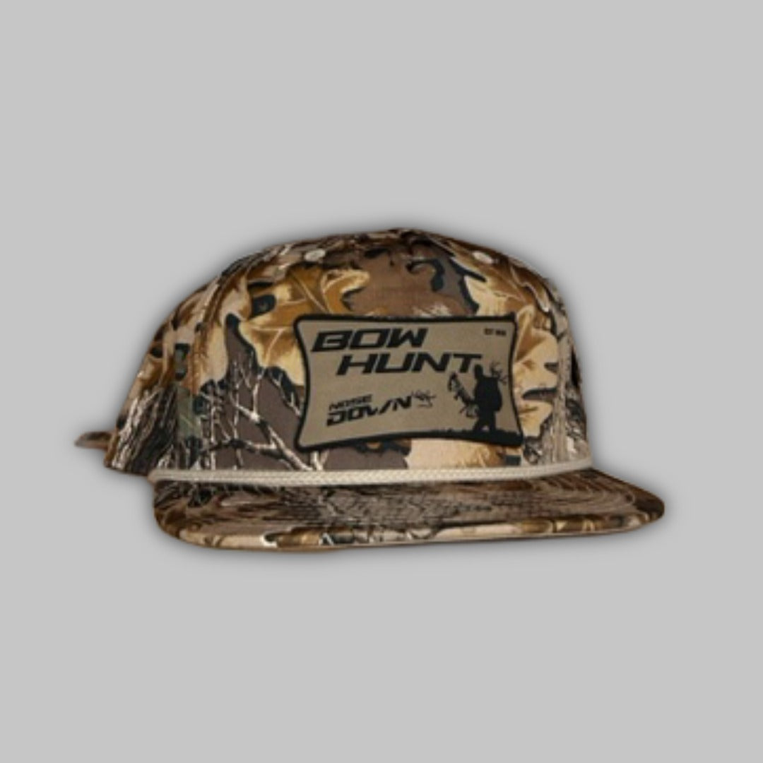 Bow Hunter Nose Down camo snapback hat featuring outdoor-inspired embroidery