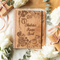 Wooden recipe book featuring a vibrant peppers-themed cover