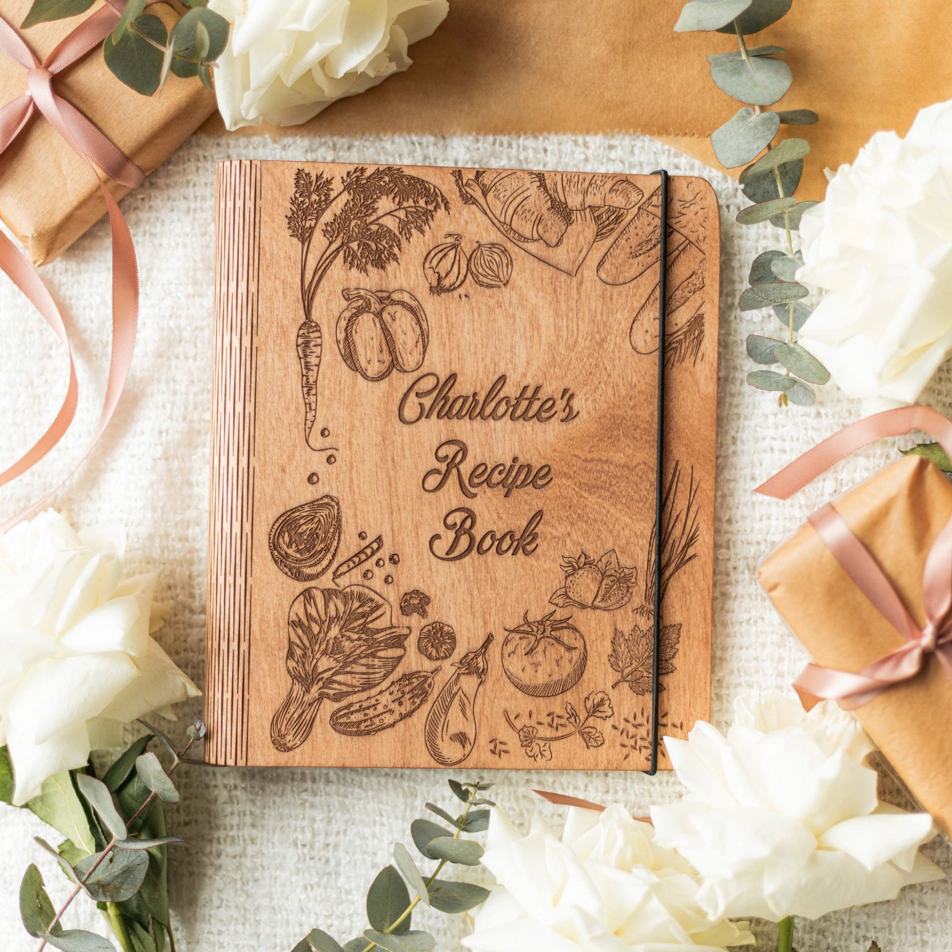 Wooden recipe book featuring a vibrant peppers-themed cover