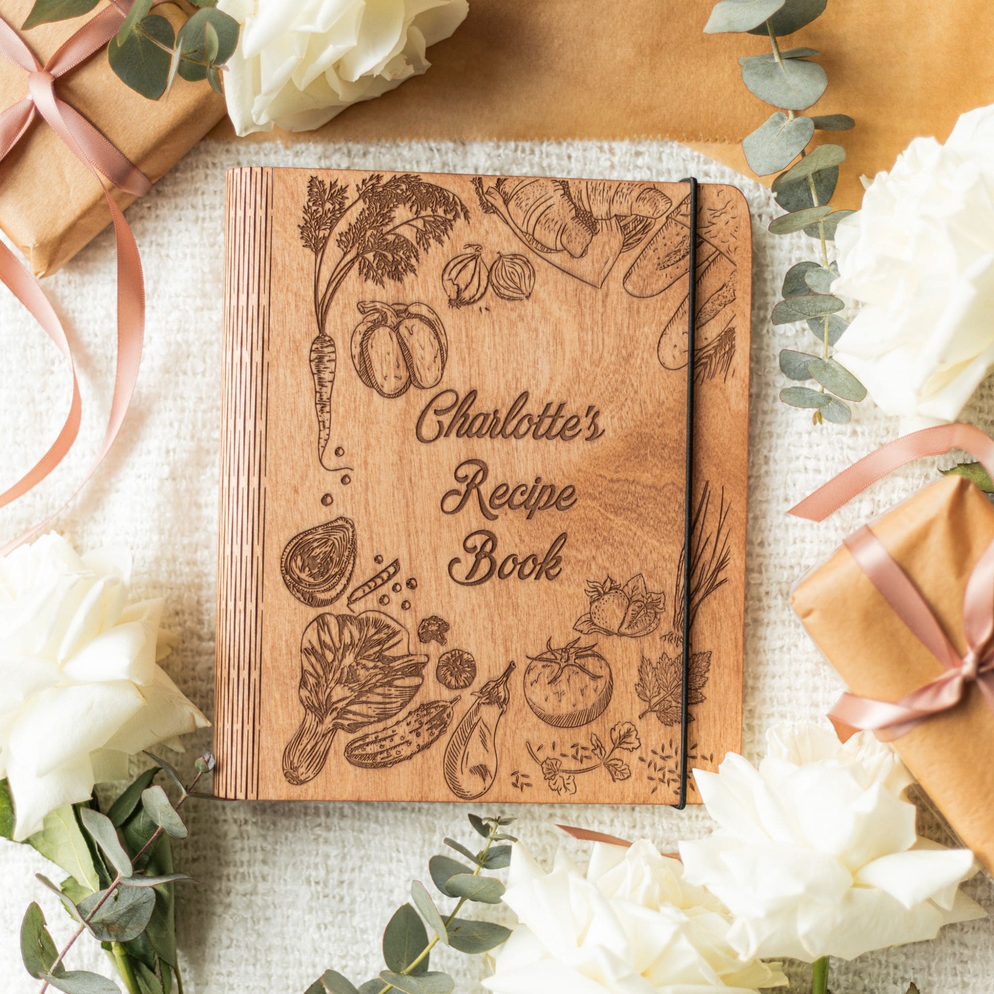 Wooden recipe book featuring a vibrant peppers-themed cover