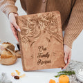 Wooden recipe book with a decorative tomato-themed cover