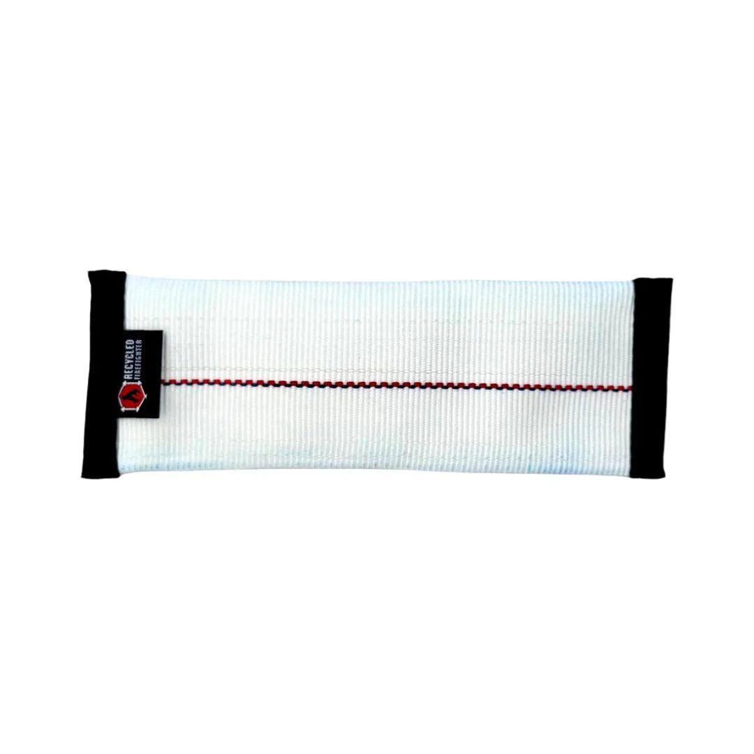 Small durable dog fetch toy made from red and black recycled fire hose