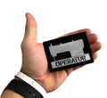 Close up of Recycled Firefighter Operator Patch in black and silver with sewing machine motif