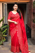 Red Pure Chanderi cotton saree featuring intricate traditional hand block prints and matching unstitched blouse fabric.