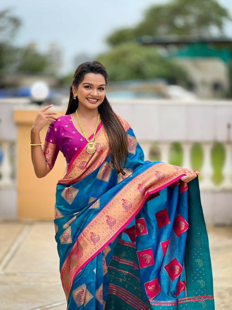 Firozi blue Soft Banarasi Silk Saree with gold Zari weaving and Meenakari accents