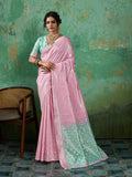 Elegant Pink Linen Cotton Saree with matching blouse piece draped in traditional style