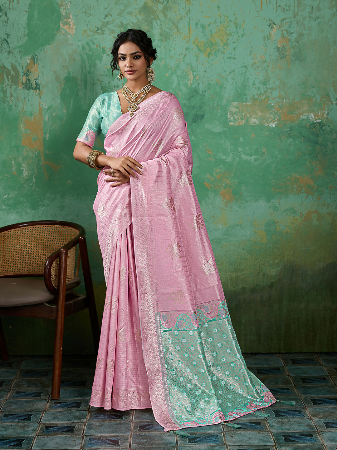 Elegant Pink Linen Cotton Saree with matching blouse piece draped in traditional style