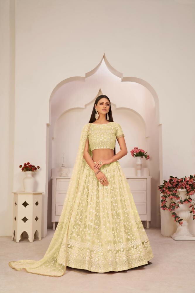 Lemon yellow butterfly net lehenga with zari, thread, and sequence embroidery